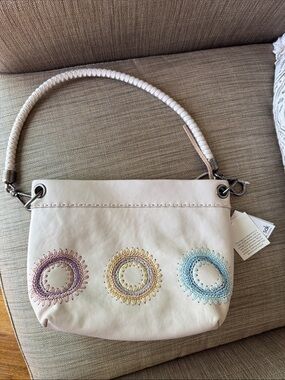 The Sak Cream Shoulder Bag with Pastel Embroidered Medallions NWT